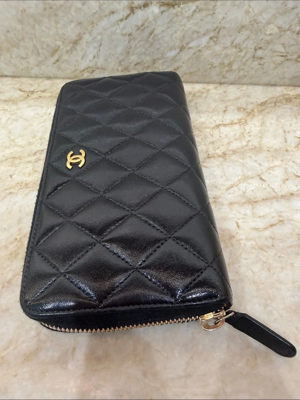 CHANEL Black Quilted Zip-Around Wallet with Gold CC